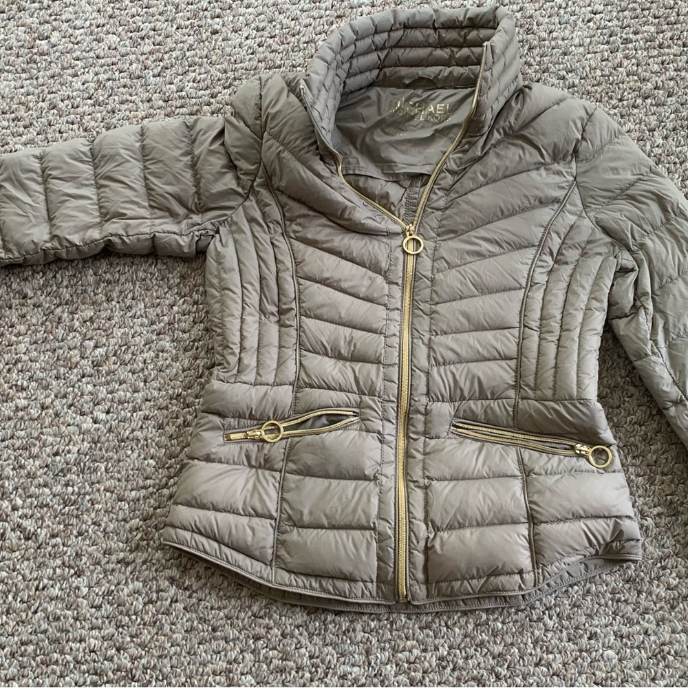 Tan women’s Michael Kors